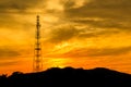 Telecommunications tower with sunset sky. Royalty Free Stock Photo