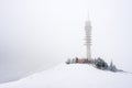 Telecommunications tower in winter Royalty Free Stock Photo