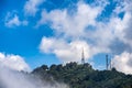 Telecommunications towers with blue sky. Royalty Free Stock Photo