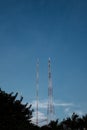 Telecommunications towers under the blue sky Royalty Free Stock Photo