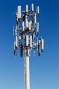 Telecommunications and Wireless Cell Equipment Tower with Directional Mobile Phone Antenna I Royalty Free Stock Photo