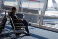 Telecommuting at the airport Royalty Free Stock Photo
