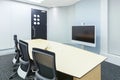 teleconferencing, video conference and telepresence business meeting room with display screen Royalty Free Stock Photo