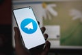 Telegram messenger chat app logo on smartphone