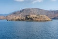 Telegraph Island off Khasab, Musandam, Oman in the Fjords near Strait of Hormuz. British telegraph lines still present. Blue sky