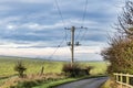 Telegraph pole and winter sunlight, by the side of a country lane at sunset,Hampshire,England,UK Royalty Free Stock Photo