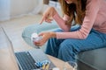 young woman sick using laptop for video conference to doctor consultation asking Royalty Free Stock Photo