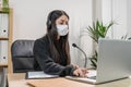 Telemarketer woman working on laptop