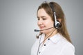 Telemarketing and customer service concept. Young smiling woman - operator. Royalty Free Stock Photo