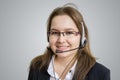 Telemarketing and customer service concept. Young smiling woman - operator. Royalty Free Stock Photo