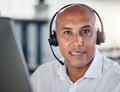 Telemarketing, face and portrait of man working in a call center as operator ready to give advice. Assistance, agent and Royalty Free Stock Photo