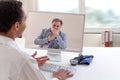 A man calls the doctor online. Telemedicine concept. Future broadcast consultation. Diagnosis from home. Royalty Free Stock Photo