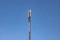 Telephone antenna on blue sky background closeup Royalty Free Stock Photo