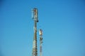 Telephone antenna under clear blue sky Royalty Free Stock Photo