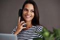 Telephone call, smile and business woman in conversation, talking or listening to contact in startup office. Landline Royalty Free Stock Photo