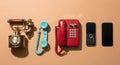 Telephone Evolution: Rotary, Push Button, Mobile, Smartphone on Beige Background, Communication Technology History Royalty Free Stock Photo