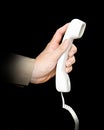 Telephone handset in hand Royalty Free Stock Photo