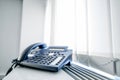 Telephone in an office window Royalty Free Stock Photo