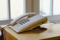 Telephone in an office window Royalty Free Stock Photo