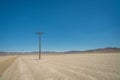 Telephone Pole in Empty Desert Royalty Free Stock Photo