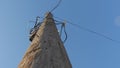 Telephone poles around the wires Royalty Free Stock Photo