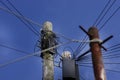 Telephone pole with wires against cloudy sky with rectangular co Royalty Free Stock Photo