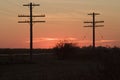 Telephone poles and sunset