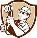 Telephone Repairman Holding Phone Shield