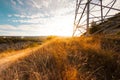 Telephone tower in the field. Royalty Free Stock Photo