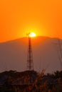 Telephone tower, radio tower during sunset. Telecommunication Tower for 2G 3G 4G 5G network, Cellular phone antenna, BTS, Royalty Free Stock Photo