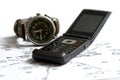 Telephone watch and map Royalty Free Stock Photo