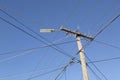 Telephone wires against a blue sky Royalty Free Stock Photo