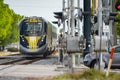 Telephoto shot of the Brightline train on tracks