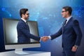 The telepresence concept with two businessman handshaking Royalty Free Stock Photo