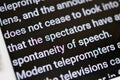 Teleprompter automatically scrolls text close-up.