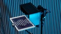 teleprompter for video. The reading text is reflected from the glass surface opposite the video camera lens