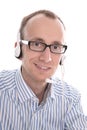 Telesales - Portrait of helpful man with headset smiling at came