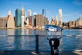 Telescope with blurred New York City silhouette Royalty Free Stock Photo