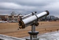 Telescope on Hague bridge in cloudy autumn day