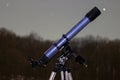 Telescope in night sky Winter edition frozen telescope Royalty Free Stock Photo