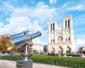 Telescope for tourists at Notre Dame de Paris. Royalty Free Stock Photo