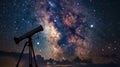 Telescope on Tripod Under Starry Night Sky Royalty Free Stock Photo