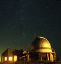 Telescope under light of thousand stars Royalty Free Stock Photo