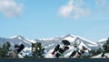 Telescopes on rooftop with snow-covered mountains in background Royalty Free Stock Photo