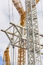 Telescopic cranes in the city skyline. Construction industry Royalty Free Stock Photo