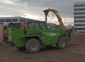 Telescopic loader on a construction site Royalty Free Stock Photo