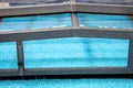 telescopic pool enclosures roof in swimming pool in summer