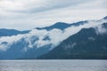 Foggy Teletskoye lake in Altai mountains