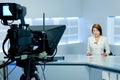 Television anchorwoman during live broadcasting Royalty Free Stock Photo