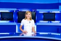Television anchorwoman at TV studio Royalty Free Stock Photo